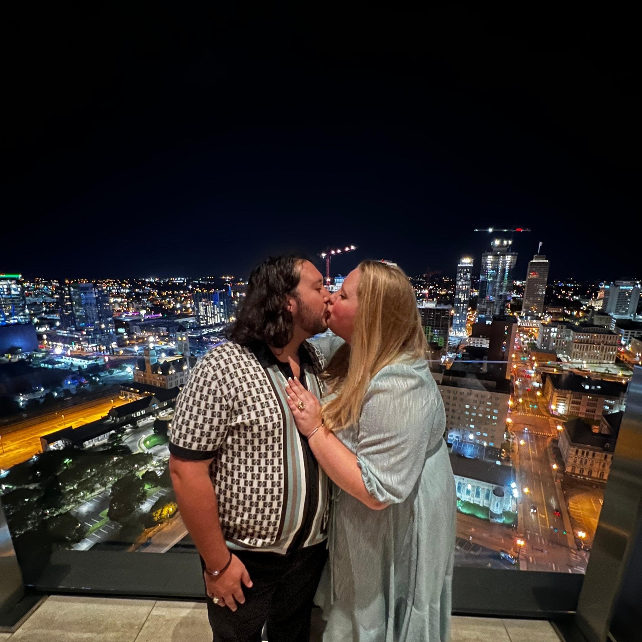 Emily & Lucas’s Surprise Skyline Proposal with a Custom Tourmaline Ring - Walton's Jewelry