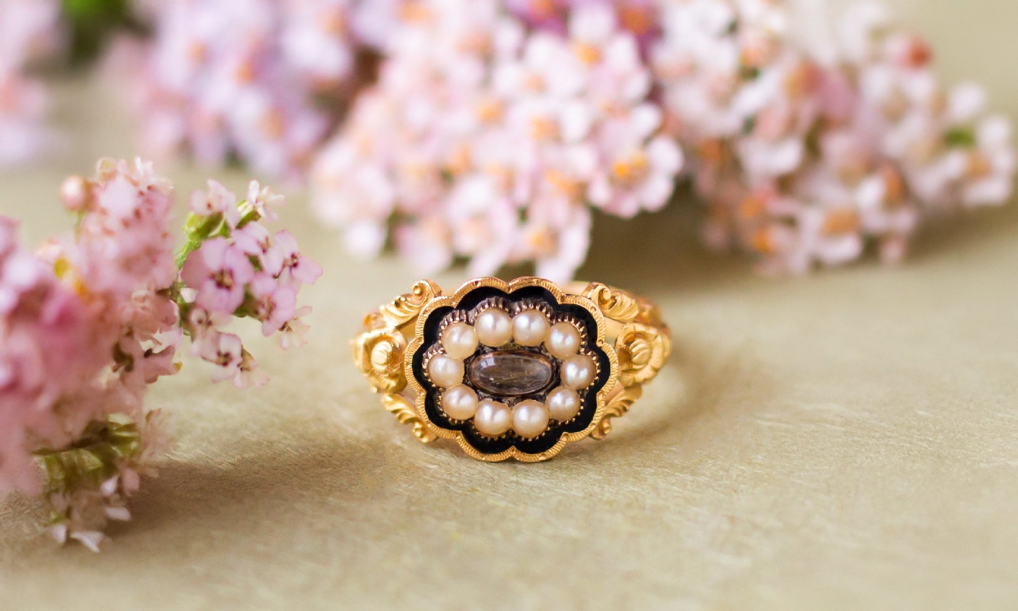 Georgian Yellow Gold, Pearl, and Black Enamel Mourning Ring with Braided Hair | Available at Walton's Jewelry